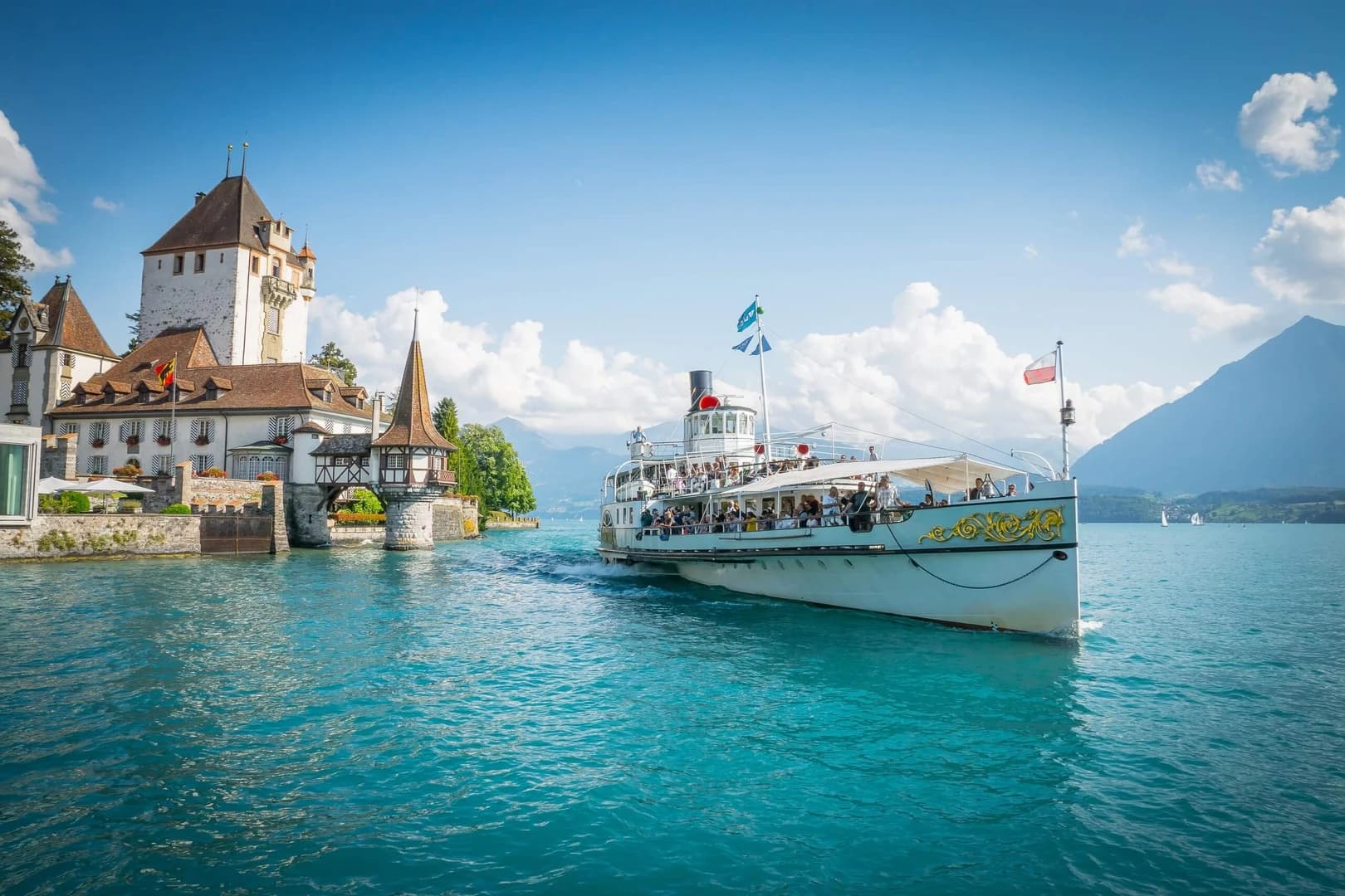 Glide Through Alpine Beauty on a Lake Cruise